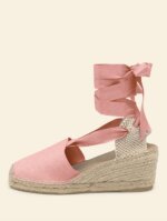 Alpargata de mujer cuña alta de 6 centímetros en color Rosa con cintas, hecha a mano en España.
